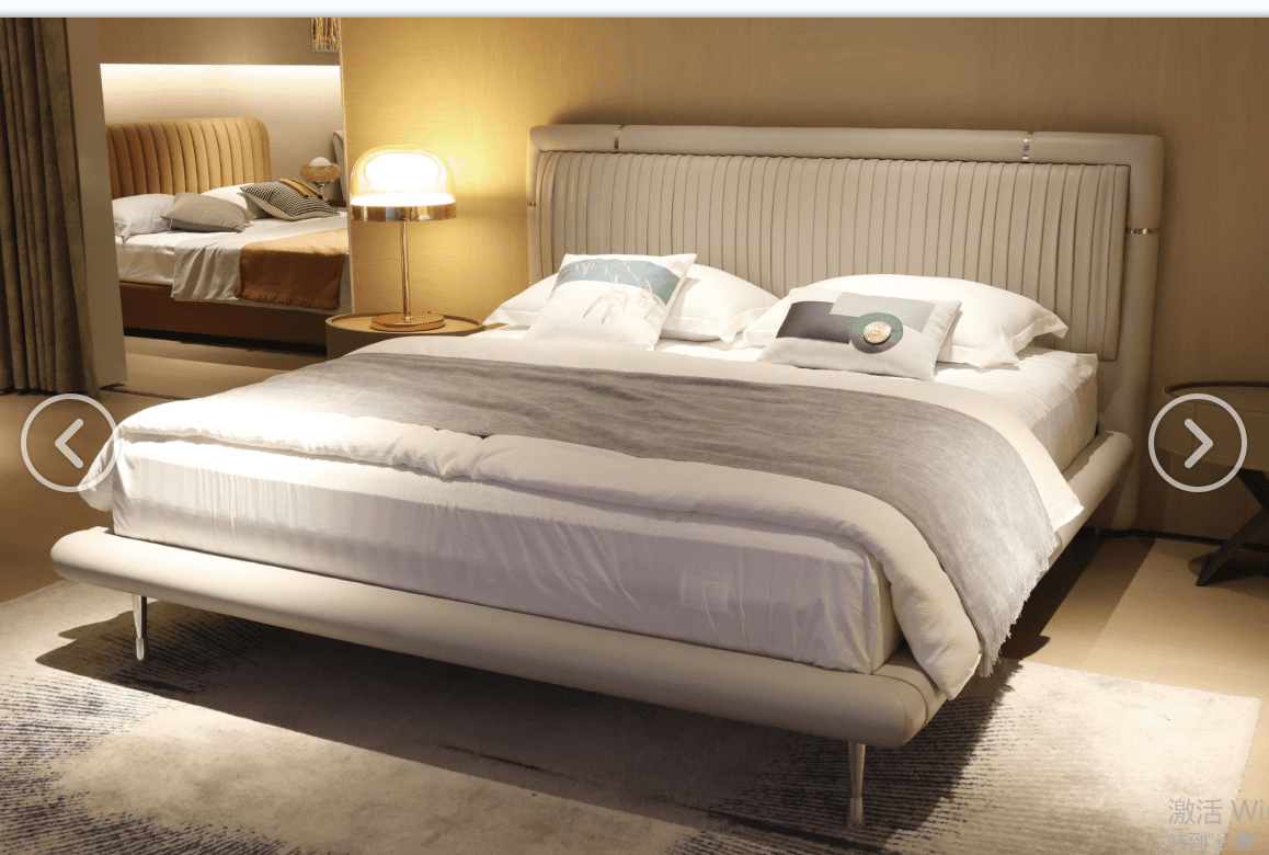 Bedroom scene photo showing the bed in a realistic room