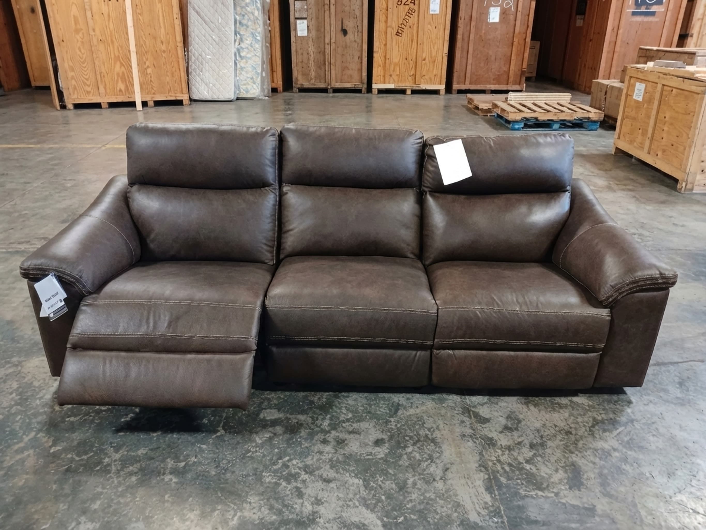 Cleaner support scene of the brown reclining sofa with a calmer setup