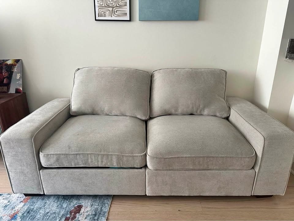 Real-room photo of the same 2-seat sofa for context